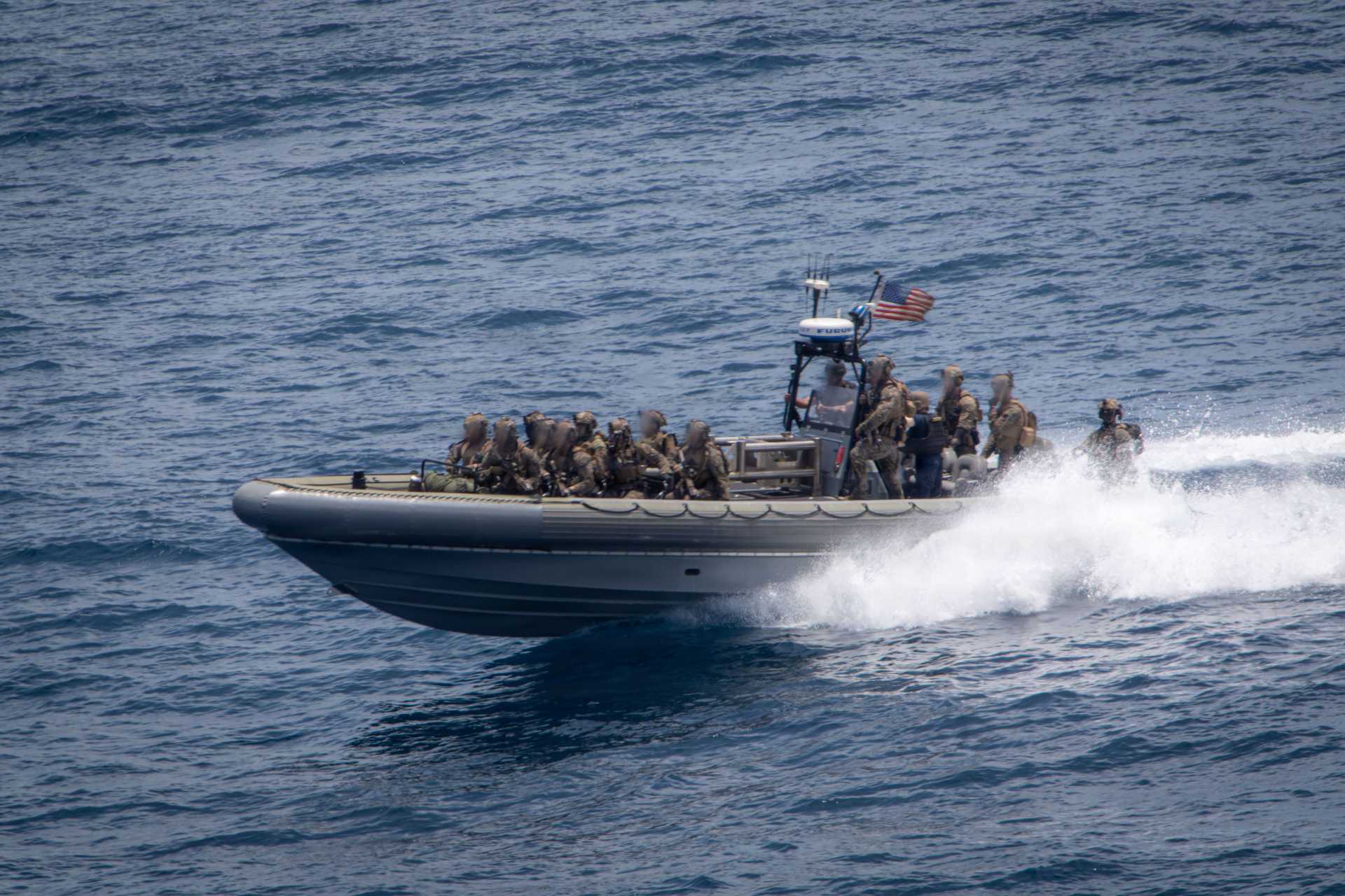 U.S. Marines and sailors assigned to Maritime Raid Force, Littoral Combat Force 24, operate a rigid-hull inflatable boat from the San Antonio-class amphibious transport dock USS San Antonio (LPD 17) during a maritime interdiction operation against a Los Choneros-linked refueling vessel in the Eastern Pacific, September 3, 2026.
