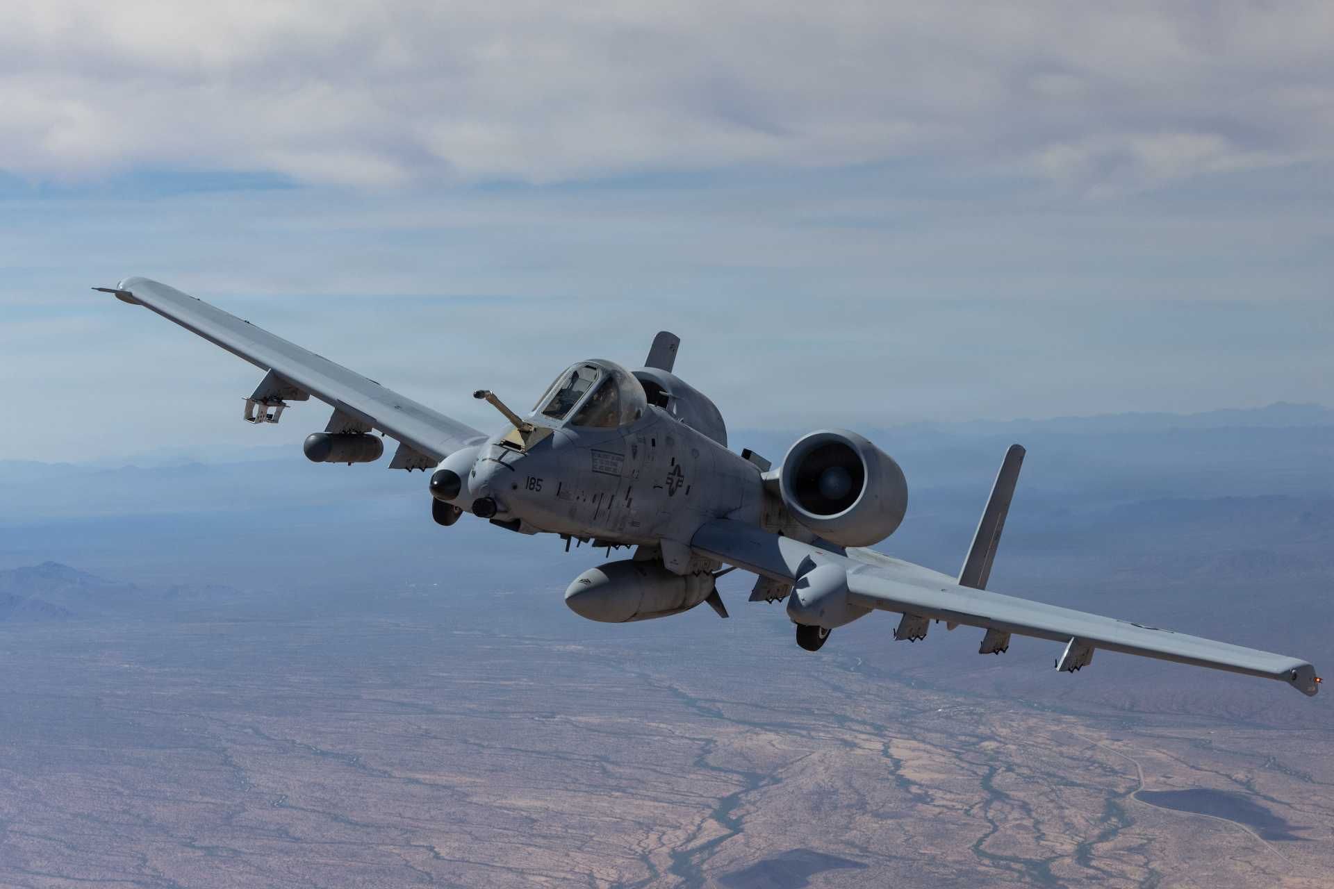 A U.S. Air Force A-10 Thunderbolt II land attack aircraft conducts its first-ever probe-and-drogue aerial refueling from a C-130 tanker on April 2, 2026, marking a major expansion in operational flexibility.
