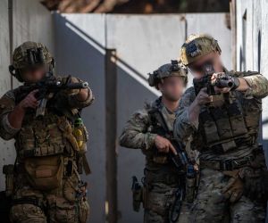 U.S. Navy SEALs participate in a training exercise. According to a July 25, 2026, New York Post report, U.S. military planners reportedly considered a contingency operation that could involve elite special operations forces to secure Iran's enriched uranium if military intervention became necessary. (Picture source: U.S. Department of War/Defense)