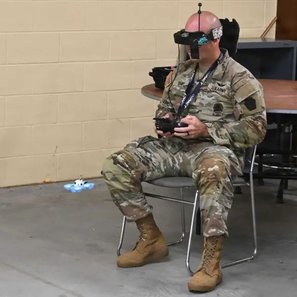 Chief Warrant Officer 2 Nathan Shea, Unmanned Aircraft Systems Operations Officer at the Fort Indiantown Gap UAS Training and Innovation Facility, pilots a first-person-view (FPV) drone during a training session at Fort Indiantown Gap, Pennsylvania, on September 2, 2025.