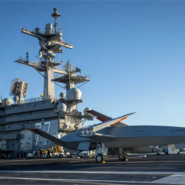 A Boeing MQ-25 Stingray unmanned tanker receives flight-deck operating directions aboard the U.S. Navy aircraft carrier USS George H.W. Bush (CVN 77). Designed as the U.S. Navy’s first operational carrier-based unmanned aircraft for aerial refueling and ISR missions, the MQ-25 is now also being examined for potential land-based operation, which could broaden its future role in distributed Indo-Pacific missions and allied air operations.