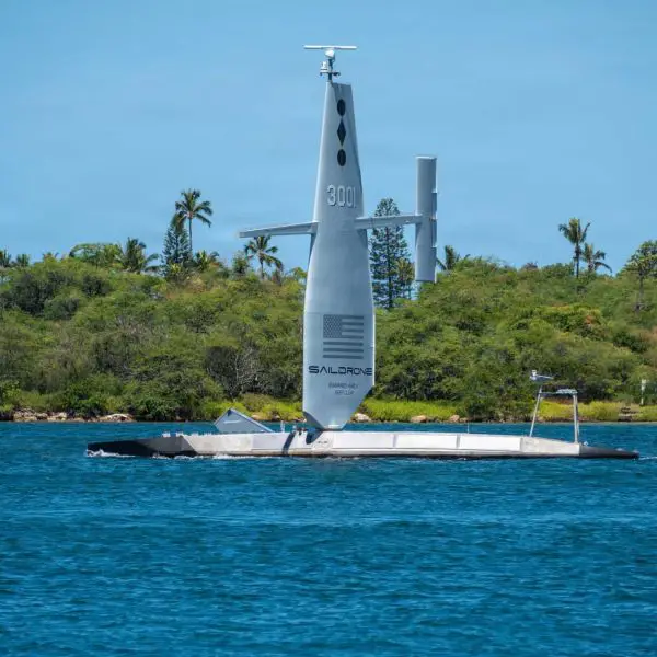 The U.S. Navy's Saildrone Surveyor (SD-3001) uncrewed surface vessel departs Joint Base Pearl Harbor-Hickam, Hawaii, on July 8, 2026, to participate in Exercise Rim of the Pacific (RIMPAC) 2026, demonstrating the Navy's expanding use of autonomous maritime systems to strengthen persistent surveillance and distributed maritime operations.