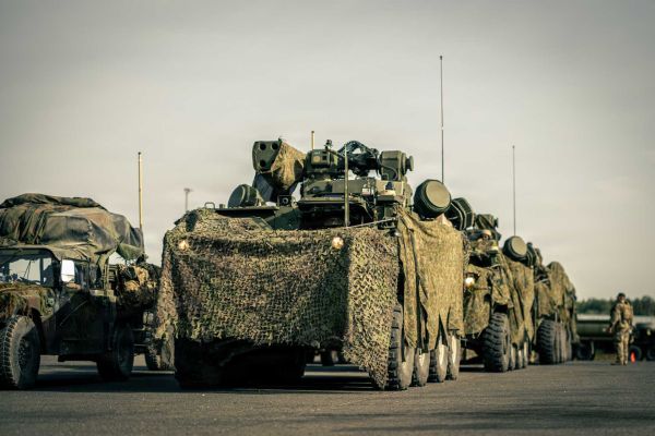 U.S. Army SGT STOUT Maneuver Short-Range Air Defense vehicles from A Battery, 5th Battalion, 4th Air Defense Artillery Regiment, prepare to enter the training area during Saber Junction 26 at Hohenfels, Germany, on August 27, 2026. The vehicles were employed to strengthen counter-UAS protection for artillery units and help shield firing positions from drone-directed targeting.