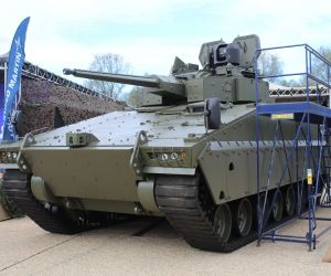 Hanwha Aerospace’s AS21 Redback IFV fitted with Lockheed Martin UK’s new 40 mm CTAS turret and SkyKeeper counter-UAS command-and-control system on display at Defence Vehicle Dynamics 2026 in Millbrook, Bedfordshire.