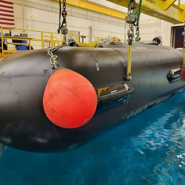 The U.S. Navy’s Orca XLUUV during basin testing illustrates the scale and mission profile of the long-range autonomous undersea vehicles being pursued under the CAMP program for payload delivery, surveillance and operations in contested waters (Picture source: Boeing).