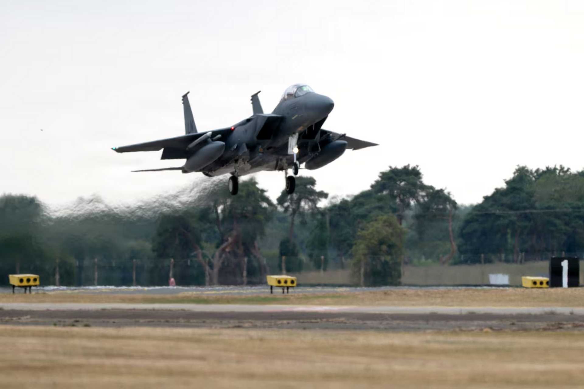 A U.S. Air Force F-15E Strike Eagle returns to RAF Lakenheath after a live-fire mission during Exercise Combat Archer U.K. 26 on July 21, 2026. The exercise culminated in the combat certification of the 492nd and 493rd Fighter Squadrons for live air-to-air warfare, strengthening NATO's air superiority and operational readiness in Europe. (Picture source: U.S. DoD)
