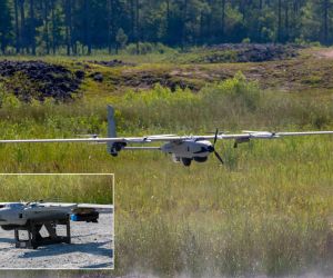 A VXE30 Stalker from the Small Unmanned Aircraft School lands after deploying a Neros Archer FPV drone during a live-fire test of lethal munitions at Camp Lejeune, North Carolina, on July 9, 2026, demonstrating its ability to integrate aerial strike capabilities and deploy FPV systems at the tactical level. (Picture source: US DoD)
