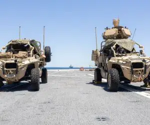 Two U.S. Marine Corps LMADIS vehicles operated by 2nd Low Altitude Air Defense personnel attached to VMM-263 Reinforced monitor the area around USS San Antonio during a simulated strait transit in the Atlantic Ocean on May 22, 2025 (Picture source: US DoD)