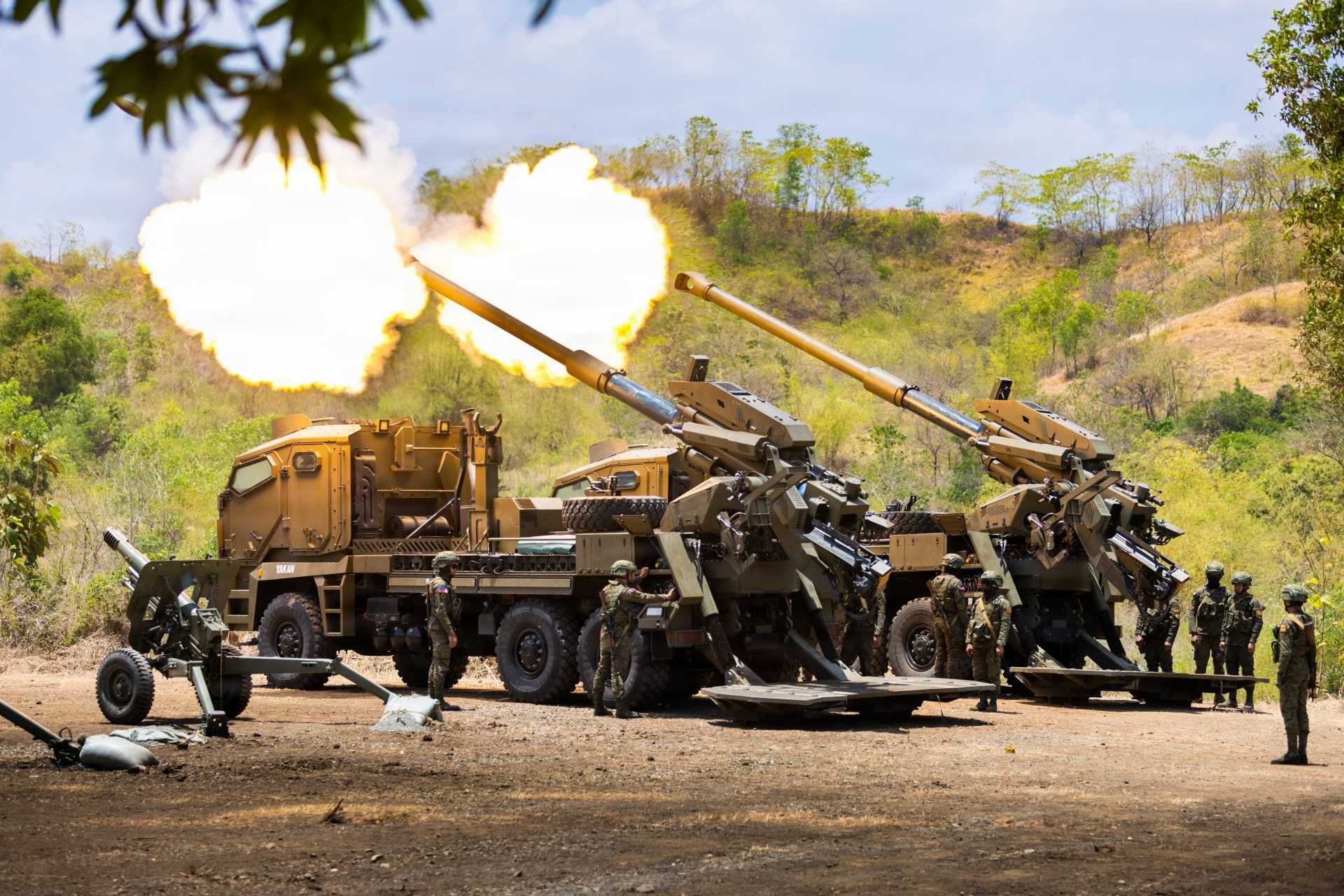 Philippine Army soldiers from the Army Artillery Regiment “King of Battle” fire ATMOS 155mm truck-mounted self-propelled howitzers during Exercise Salaknib 26 at Fort Magsaysay Combat Readiness Training Area in Canantong, Nueva Ecija, Philippines, on April 16, 2026.
