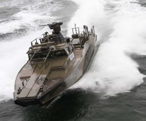 The CB90 is a Swedish fast assault craft designed to move 18 equipped troops directly onto shallow shorelines at 40 to 45 knots, combining a 0.8 to 0.9 m draught and twin-waterjet propulsion with up to 1,800 hp. (Picture source: Saab)