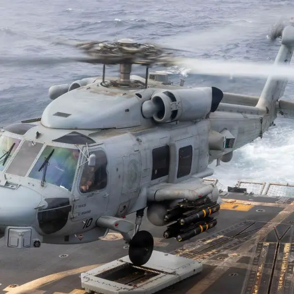 A Hellfire-armed U.S. Navy MH-60R Sea Hawk operating from USS Rafael Peralta provides the destroyer with a mobile airborne precision-strike capability that extends its surface-warfare reach across the Middle East (Picture Source: U.S. Navy)