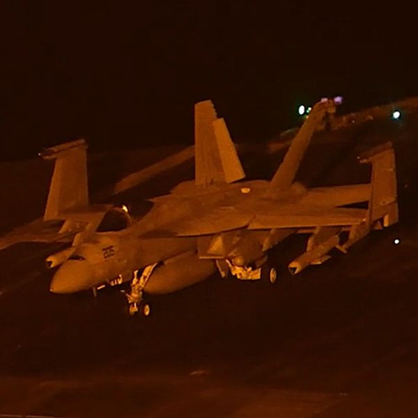 U.S. Navy imagery shows an F/A-18E Super Hornet aboard USS George Washington apparently carrying two SLAM-ER-family missiles, underscoring the carrier air wing’s long-range precision-strike capability in the U.S. 5th Fleet area (Picture Source: U.S. Navy)