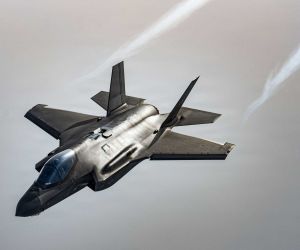 A U.S. Air Force F-35 Lightning II assigned to the 48th Fighter Wing flies over the North Sea during Exercise Point Blank on January 29, 2026. The Pentagon plans to add a Starshield-enabled Beyond Line of Sight satellite communications capability to the F-35 by 2031, allowing the fighter to exchange track data across extended distances for long-range kill-chain management.