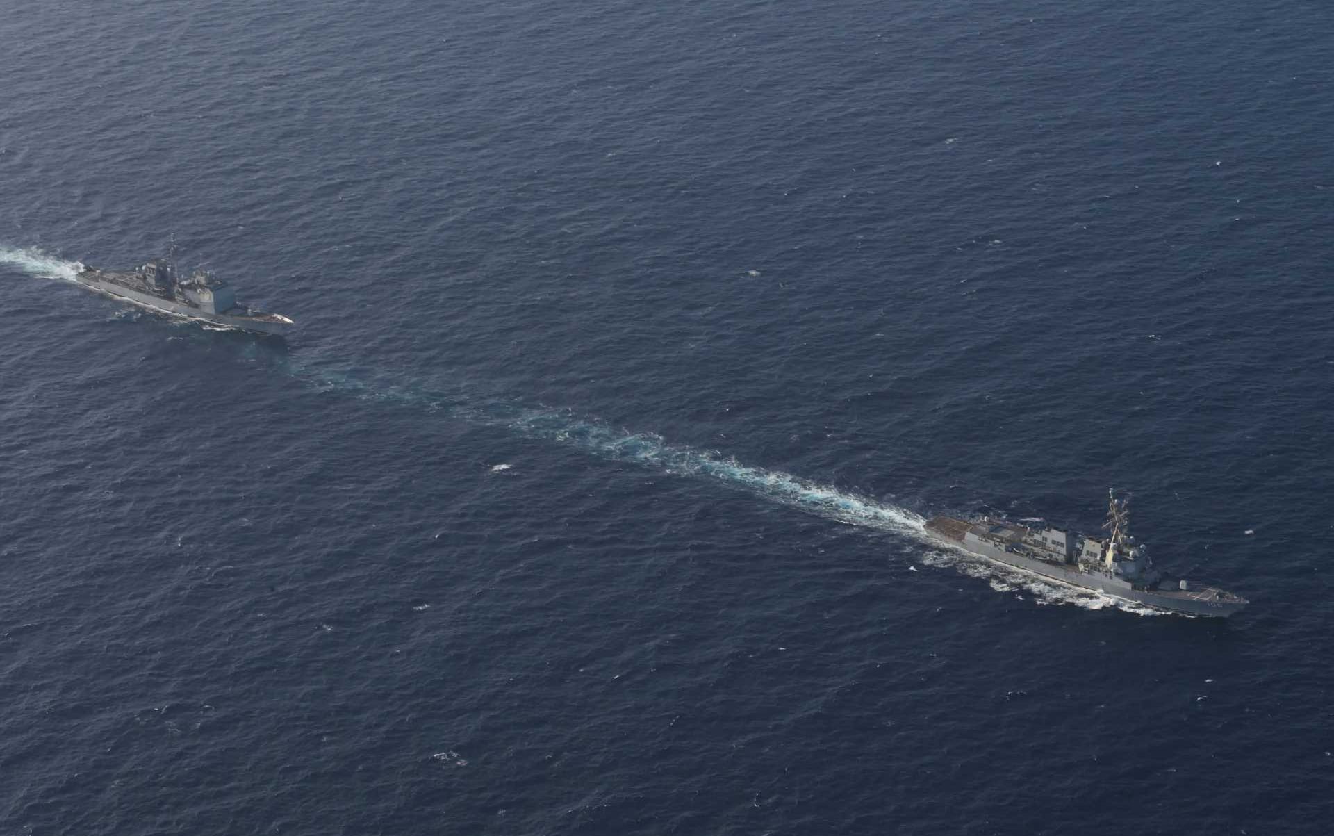 U.S. Navy Ticonderoga-class guided missile cruiser USS Gettysburg (CG 64) and Arleigh Burke-class guided missile destroyer USS Stockdale (DDG 106), right, conduct a passage transit in the international waters of the Caribbean Sea, Nov. 13, 2025.