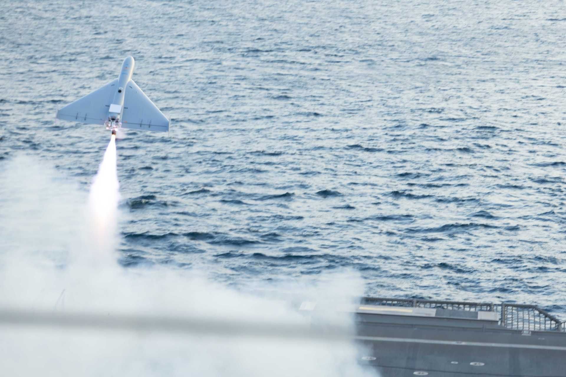 A LUCAS one-way attack drone launches from USS Santa Barbara during U.S. Central Command operations in the Arabian Gulf in December 2025. Falcon Strike will expand this concept into a multinational force combining aerial, surface and underwater attack systems.