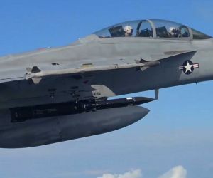 Screenshot from a NAVAIR video released on September 25, 2026, showing a U.S. Navy F/A-18E/F Super Hornet carrying a Blackbeard hypersonic strike missile beneath its wing during flight testing.