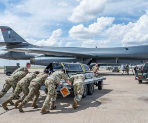 U.S. Airmen position a live AGM-158C LRASM near a B-1B Lancer during LRASM Event Zero at Dyess Air Force Base, Texas, on June 2, 2026. The event validated updated aircraft and missile software integration procedures.