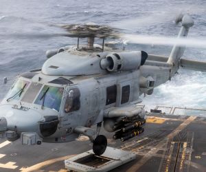 A Hellfire-armed U.S. Navy MH-60R Sea Hawk operating from USS Rafael Peralta provides the destroyer with a mobile airborne precision-strike capability that extends its surface-warfare reach across the Middle East (Picture Source: U.S. Navy)