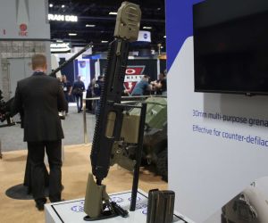 The FN MTL-30 is a semi-automatic 30 mm grenade launcher designed to engage enemy troops behind cover, small drones, and lightly armored vehicles at ranges of up to 500 meters, including with programmable airburst grenades. (Picture source: Army Recognition)