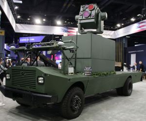 AeroVironment's LOCUST X3 high-energy laser counter-drone system mounted on American Rheinmetall's MUSKOX unmanned ground vehicle at AUSA 2026 in Washington, D.C., October 12, 2026. (Picture source: Army Recognition)