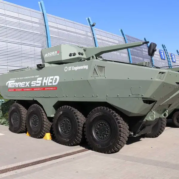 ST Engineering’s Terrex s5 HED hybrid-electric 8×8 armored vehicle on display at MSPO 2026 in Kielce, Poland, highlighting its 50 km silent electric range, 1,200 hp traction output and up to 450 kW of onboard electrical power for next-generation sensors, counter-drone systems and electronic warfare equipment.