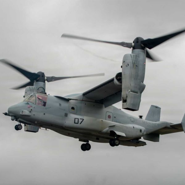 A U.S. Marine Corps MV-22B Osprey assigned to Marine Medium Tiltrotor Squadron (VMM) 164 (Reinforced), 15th Marine Expeditionary Unit, inserts Marines during Exercise RIMPAC 2026 at Marine Corps Training Area Bellows, Hawaii, on July 25, 2026, demonstrating the aircraft's long-range assault capability in support of expeditionary operations.