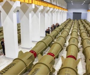 Kim Jong Un inspects a hall at the February 11 Factory in Hamhung in June 2026.