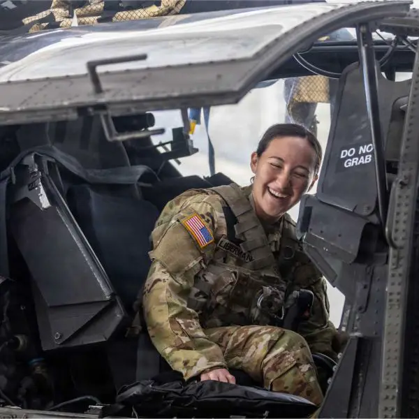 A U.S. Army 101st Combat Aviation Brigade pilot prepares for flight testing of the Advanced Inflight Relief Universal System (AIRUS) aboard an AH-64 Apache attack helicopter at Fort Campbell, Kentucky, on October 5, 2026. The new equipment is designed to improve aircrew comfort and endurance during extended combat missions. (Picture source: U.S. Army)
