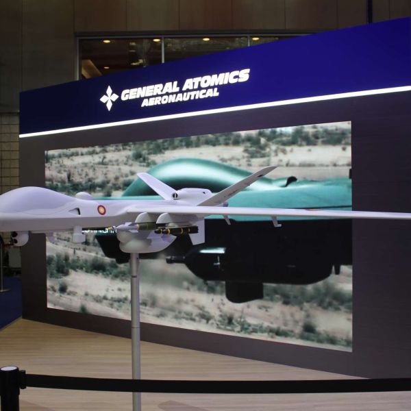 An armed MQ-9B SeaGuardian configured with AGM-114R2 Hellfire missiles and 500-pound precision-guided munitions, illustrating its ability to conduct long-endurance maritime surveillance combined with pinpoint strikes against surface vessels, coastal targets, and time-sensitive threats in contested littoral environments (Picture source: Army Recognition Group).