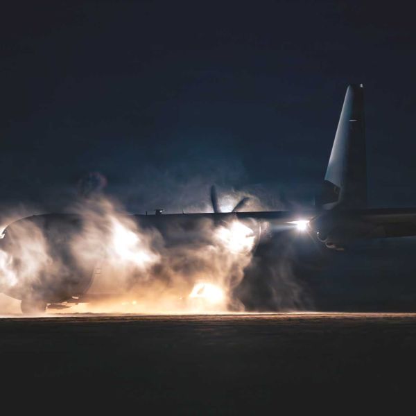A U.S. Air Force C-130J Super Hercules assigned to the 37th Airlift Squadron maneuvers across a sand landing zone in Rømø, Denmark, during Exercise Northern Viking 26 on August 25, 2026, testing austere landing operations for Arctic and High North missions.