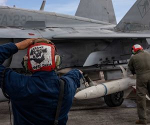 U.S. Marine Corps Cpl. Antonio Barrios, left, and Sgt. Ruben Medina, both aviation ordnance technicians with Marine Fighter Attack Squadron (VMFA) 232, Marine Aircraft Group 12, 1st Marine Aircraft Wing, secure an AGM-88 HARM during an Aviation Training Relocation program at Andersen Air Force Base, Guam, Feb. 5, 2026.