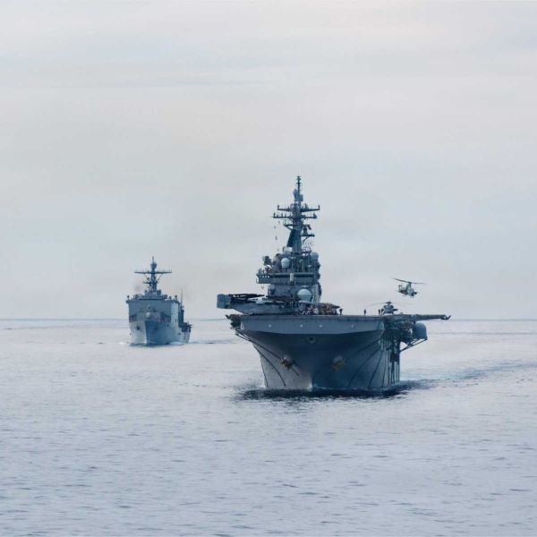 The Boxer Amphibious Ready Group, escorted by the Ticonderoga-class guided-missile cruiser USS Princeton (CG-59), executes a simulated strait transit in the Pacific Ocean on January 27, 2026. The maneuver strengthened Navy-Marine Corps integration and force protection procedures as the 11th Marine Expeditionary Unit conducted high-end integrated training operations in the U.S. 3rd Fleet area of responsibility.