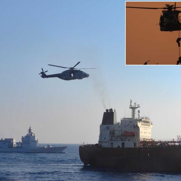 Italian Navy personnel board the suspected Russian shadow fleet oil tanker Toa Payoh from a helicopter launched by ITS Thaon di Revel during an EU sanctions enforcement operation in the Mediterranean on August 2, 2026. (Photo: Italian Ministry of Defence)