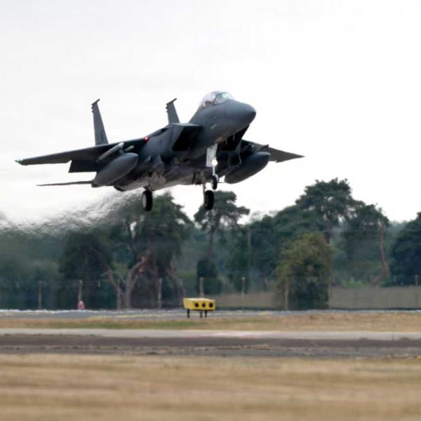A U.S. Air Force F-15E Strike Eagle returns to RAF Lakenheath after a live-fire mission during Exercise Combat Archer U.K. 26 on July 21, 2026. The exercise culminated in the combat certification of the 492nd and 493rd Fighter Squadrons for live air-to-air warfare, strengthening NATO's air superiority and operational readiness in Europe. (Picture source: U.S. DoD)