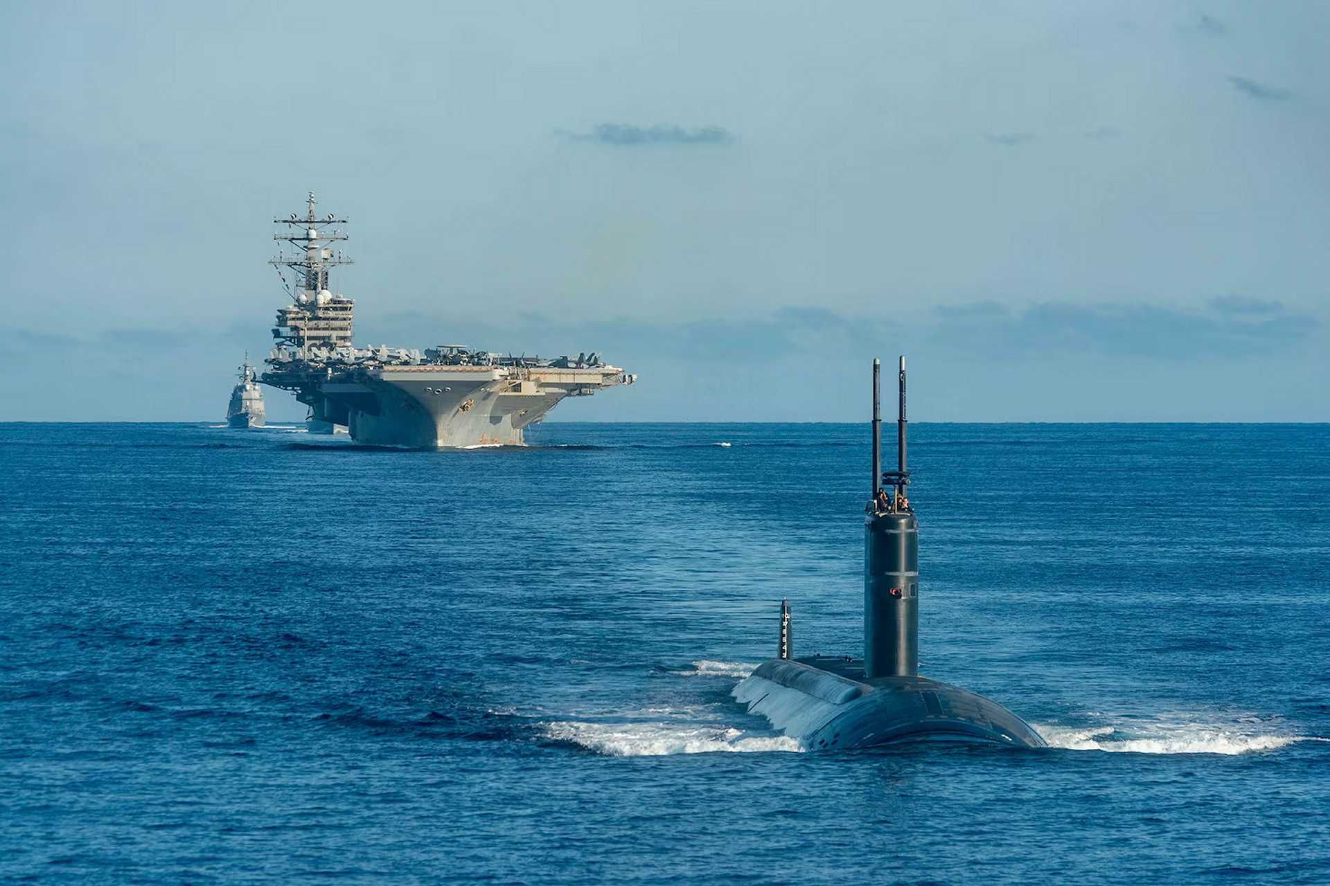 U.S. Navy submarine underway during undersea warfare operations, illustrating U.S.-Japan-South Korea anti-submarine cooperation in the Western Pacific.