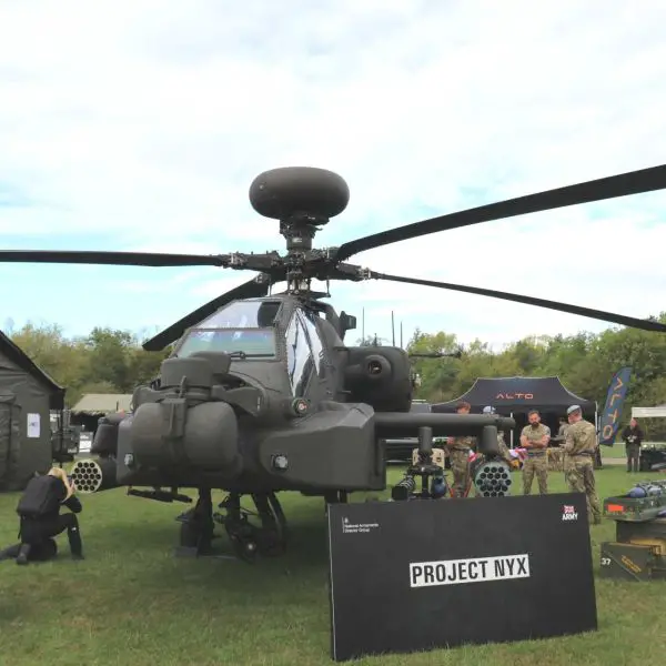 British Army Project NYX is set to expand the operational capabilities of the U.S.-made AH-64E Apache by teaming attack helicopters with armed autonomous drones for reconnaissance targeting electronic warfare and precision strike missions in high-threat environments.