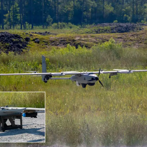 A VXE30 Stalker from the Small Unmanned Aircraft School lands after deploying a Neros Archer FPV drone during a live-fire test of lethal munitions at Camp Lejeune, North Carolina, on July 9, 2026, demonstrating its ability to integrate aerial strike capabilities and deploy FPV systems at the tactical level. (Picture source: US DoD)