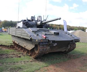 British Army Ajax tracked reconnaissance vehicle displayed at DVD 2026, highlighting its 40 mm CTAS cannon, advanced sensor suite, digital architecture and enhanced protection for future armoured reconnaissance missions.