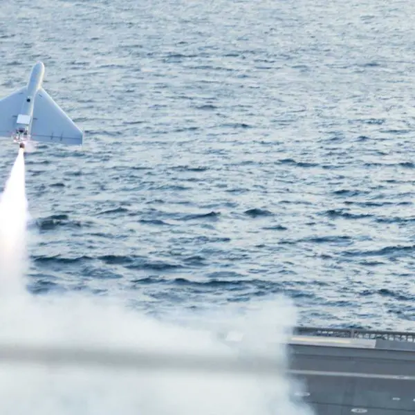 A LUCAS one-way attack drone launches from USS Santa Barbara during U.S. Central Command operations in the Arabian Gulf in December 2025. Falcon Strike will expand this concept into a multinational force combining aerial, surface and underwater attack systems.