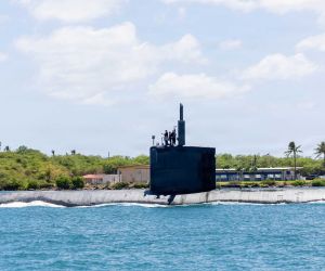 The Virginia-class attack submarine USS New Mexico (SSN 779) arrives at Portsmouth Naval Shipyard for scheduled maintenance on February 21, 2026. The U.S. Navy is equipping both new-construction and in-service submarines with advanced Lockheed Martin electronic warfare systems to enhance survivability against increasingly capable submarine and maritime threats from China and Russia.