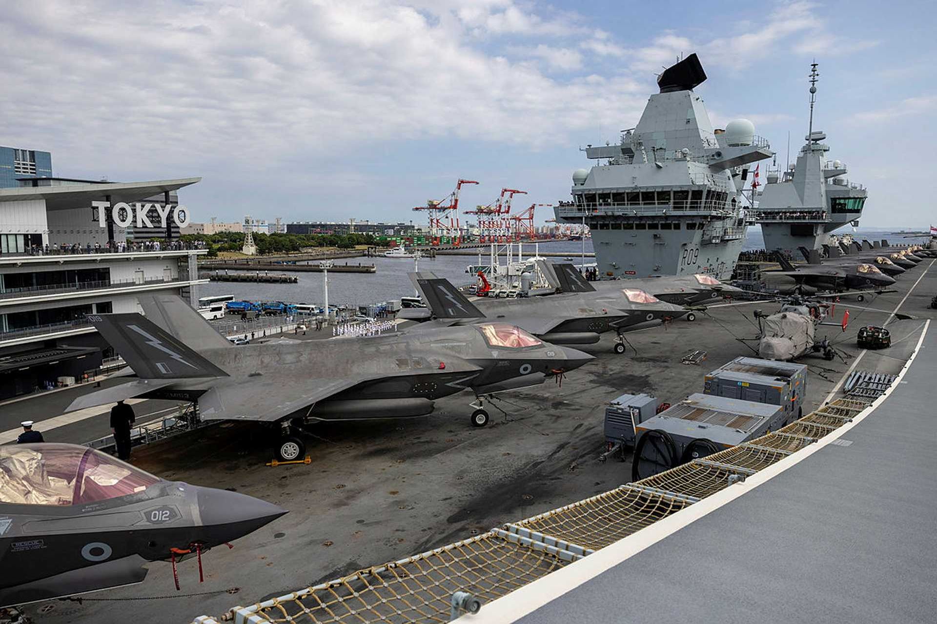 British F-35B Lightning II fighter jets parked on the flight deck of HMS Prince of Wales during the 2025 Indo-Pacific Carrier Strike Group deployment.