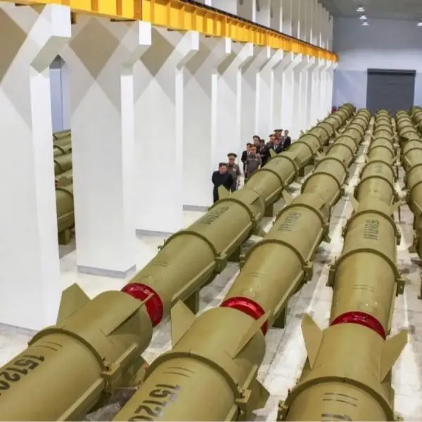 Kim Jong Un inspects a hall at the February 11 Factory in Hamhung in June 2026.