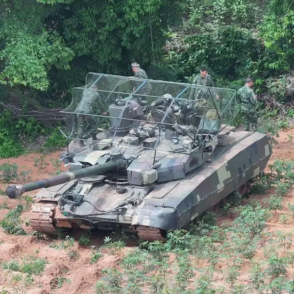 Images appearing to show Royal Thai Army T-84 Oplot-T tanks with foldable overhead mesh suggest Thailand is testing low-cost protection against FPV drone attacks (Picture Source: Social Media)