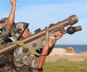 A Chinese soldier operates the QW-12 man-portable air defense system (MANPADS). If delivered to Iran, the advanced short-range surface-to-air missile could strengthen Tehran's ability to defend strategic military and nuclear sites against low-altitude aerial missions supporting future U.S. and Israeli air campaigns. (Picture source: Chinese Internet)