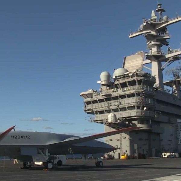 Boeing’s MQ-25 Stingray test aircraft conducts carrier deck operations aboard USS George H.W. Bush (CVN-77) in December 2021, marking a major milestone toward integrating autonomous aerial refueling drones into future U.S. Navy carrier air wings.