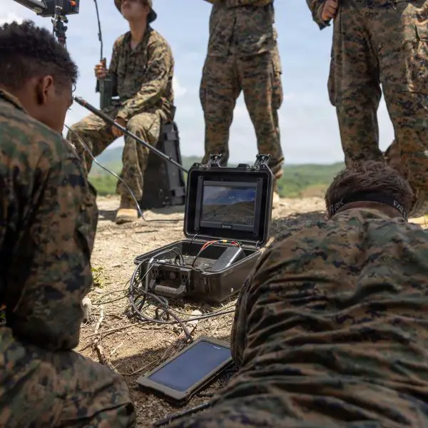 U.S. Marines assigned to the 3rd Littoral Combat Team, 3rd Marine Littoral Regiment, 3rd Marine Division, monitor the live video feed from an unmanned aerial system during dry-fire training at Fort Magsaysay, Nueva Ecija, Philippines, on June 14, 2026, as they prepare for KAMANDAG 10.