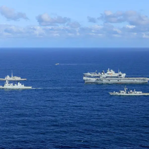 HMS Prince of Wales leads a NATO carrier strike group during Neptune Strike 26-3 in the High North, combining F-35B fighters, air-defence destroyers, anti-submarine frigates and support ships to test readiness, deterrence and multinational interoperability (Picture source: UK Royal Navy).