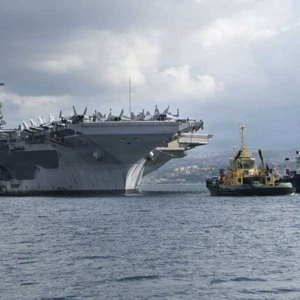 U.S. Navy USS Gerald R. Ford (CVN 78), the world’s largest aircraft carrier, conducts forward naval operations during a record deployment exceeding 300 days linked to combat operations against Venezuela and Iran. The Ford-class aircraft carrier became a central element of U.S. military power projection across multiple theaters, highlighting both the global reach and growing operational strain of the U.S. Navy amid simultaneous crises in the Caribbean and Middle East.