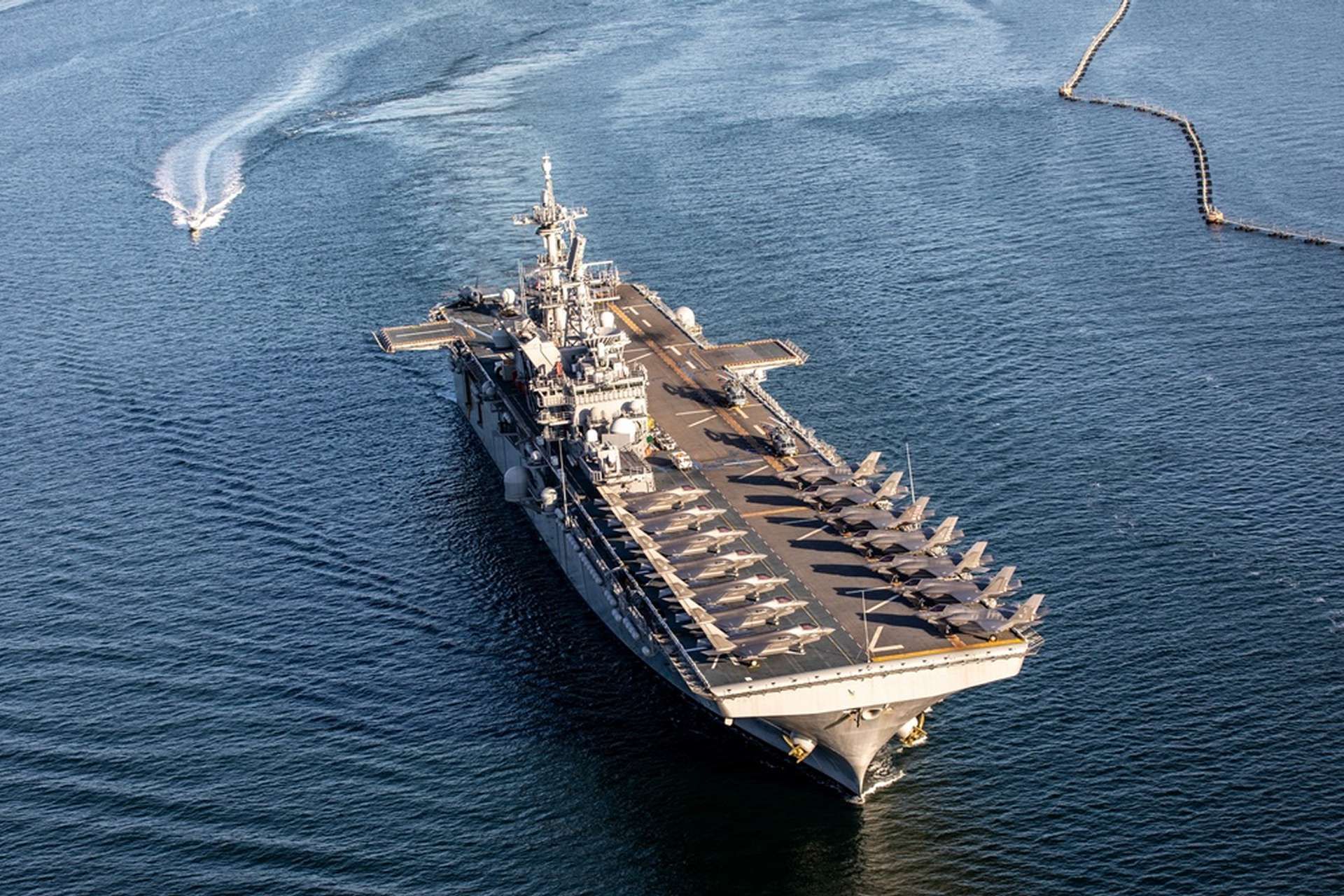 U.S. Marine forces centered on USS Tripoli and USS Boxer are moving into CENTCOM with F-35B fighters, MV-22 Ospreys, and amphibious assault capabilities, strengthening Washington’s rapid-response options for securing the Strait of Hormuz and deterring further Iranian escalation (Picture source: U.S. DoW).