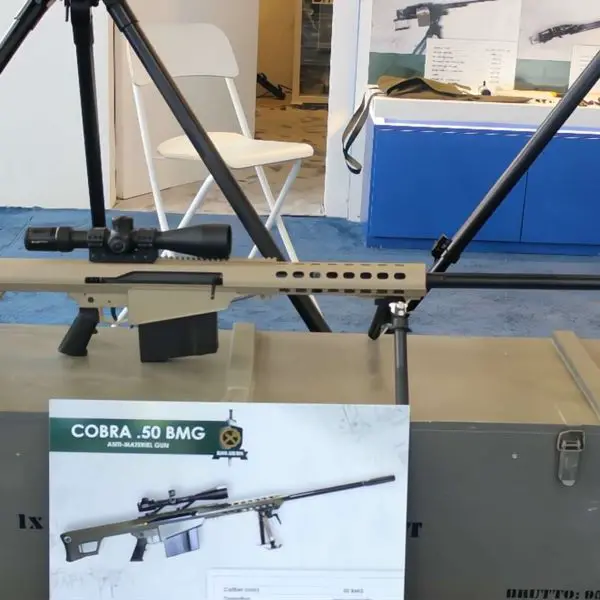 KolArms COBRA .50 BMG semi-automatic anti-materiel rifle shown at WDS in Saudi Arabia, featuring a 750 mm barrel, 10-round magazine, long Picatinny rail for day and clip-on optics, and recoil-mitigating muzzle brake for rapid follow-up shots against vehicles, equipment, and hardened targets at extended range (Picture source: Army Recognition Group).